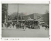 Black and white photo of a line of six Virginia Power and Passenger Streetcars surrounded by crowds of people. From the photo collection of the Library of Virginia. 